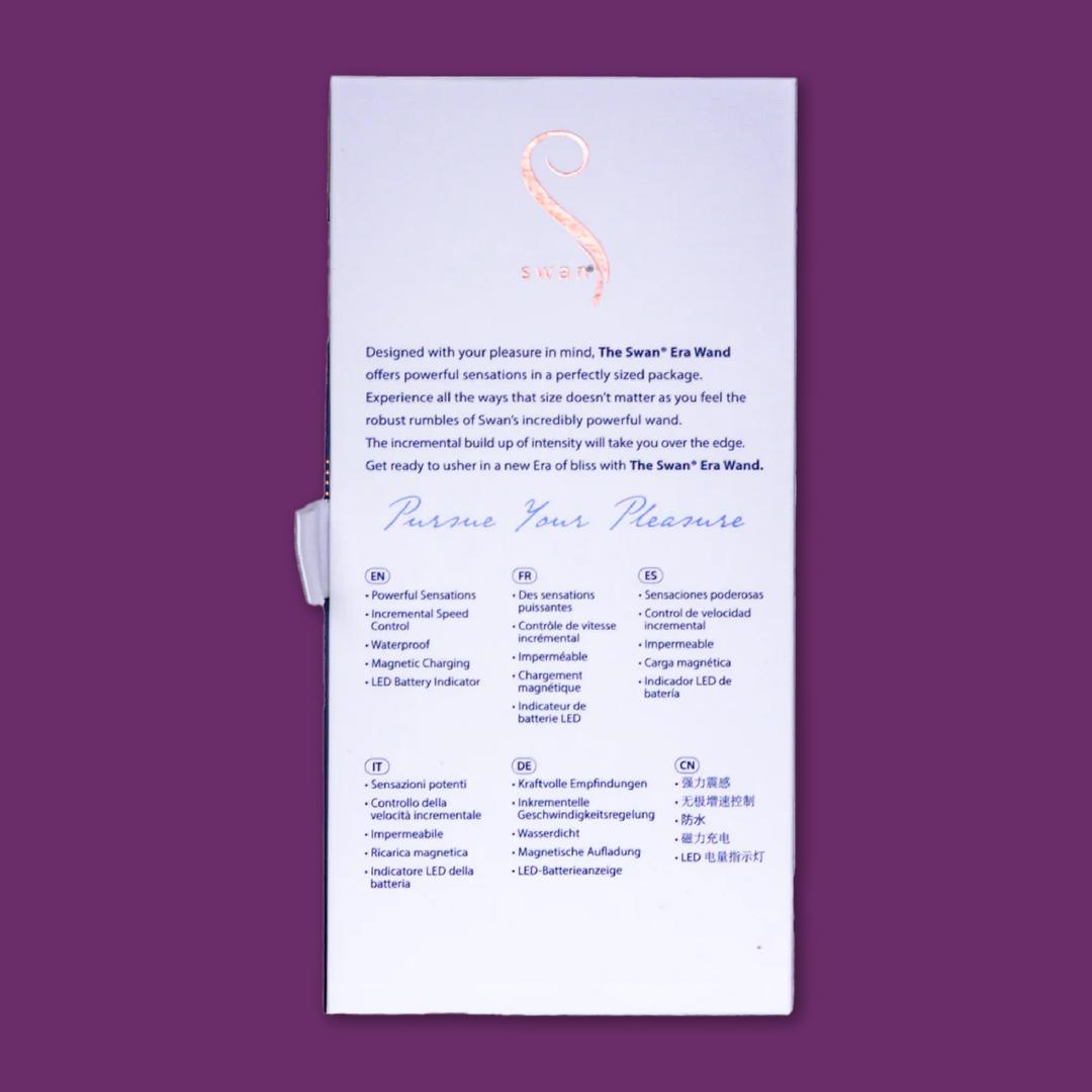 The back of a white BMS product box describes "The Swan Era Wand," showcasing its PowerBullet motor and incremental speed control in multiple languages, set against a purple background.