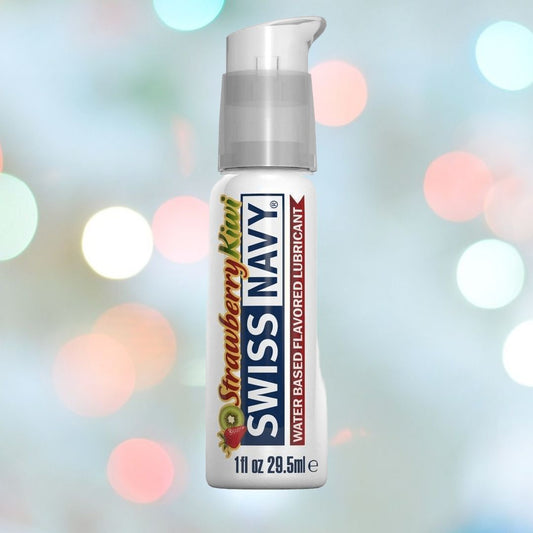 A 1oz bottle of Swiss Navy Strawberry Kiwi Flavored Lubricant, featuring a diabetic-friendly, water-based formula, is set against a blurred backdrop with vibrant bokeh lights. 1080