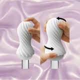 Two hands twist and squeeze the Tenga Flex Bubbly Blue, a reusable pleasure sleeve with a swirled design, against a soft purple background. Black arrows show the twisting motion that produces a unique suction sensation.