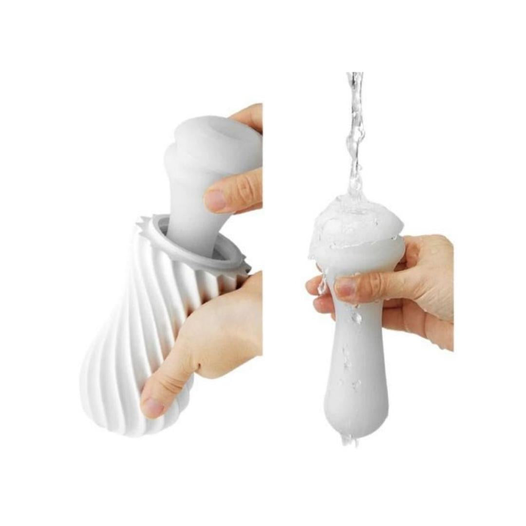 Two images show hands holding and cleaning the Tenga Flex Bubbly Blue pleasure sleeve. On the left, the blue textured sleeve is partially inside its ribbed case; on the right, it's rinsed with water for easy washing.