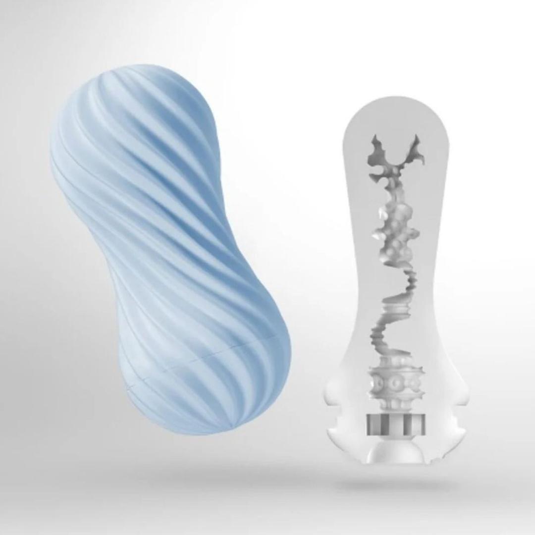 A light blue, peanut-shaped TENGA Flex Stroker Toy by Tenga with a spiral design is shown beside a cutaway revealing its intricate inner texture. Both reusable toys are displayed on a plain white background.