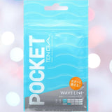 A partially transparent Tenga Pocket Wave Line package, in blue and white with wavy lines, is shown against a blurred light background. This disposable, smooth male masturbation sleeve offers travel-friendly pleasure.