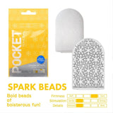 A yellow Tenga Pocket Spark Beads package sits beside the smooth, white disposable male masturbation sleeve from Tenga. Charts rate it as soft, gently stimulating, and delicate, with bold Spark Beads for extra sensation.