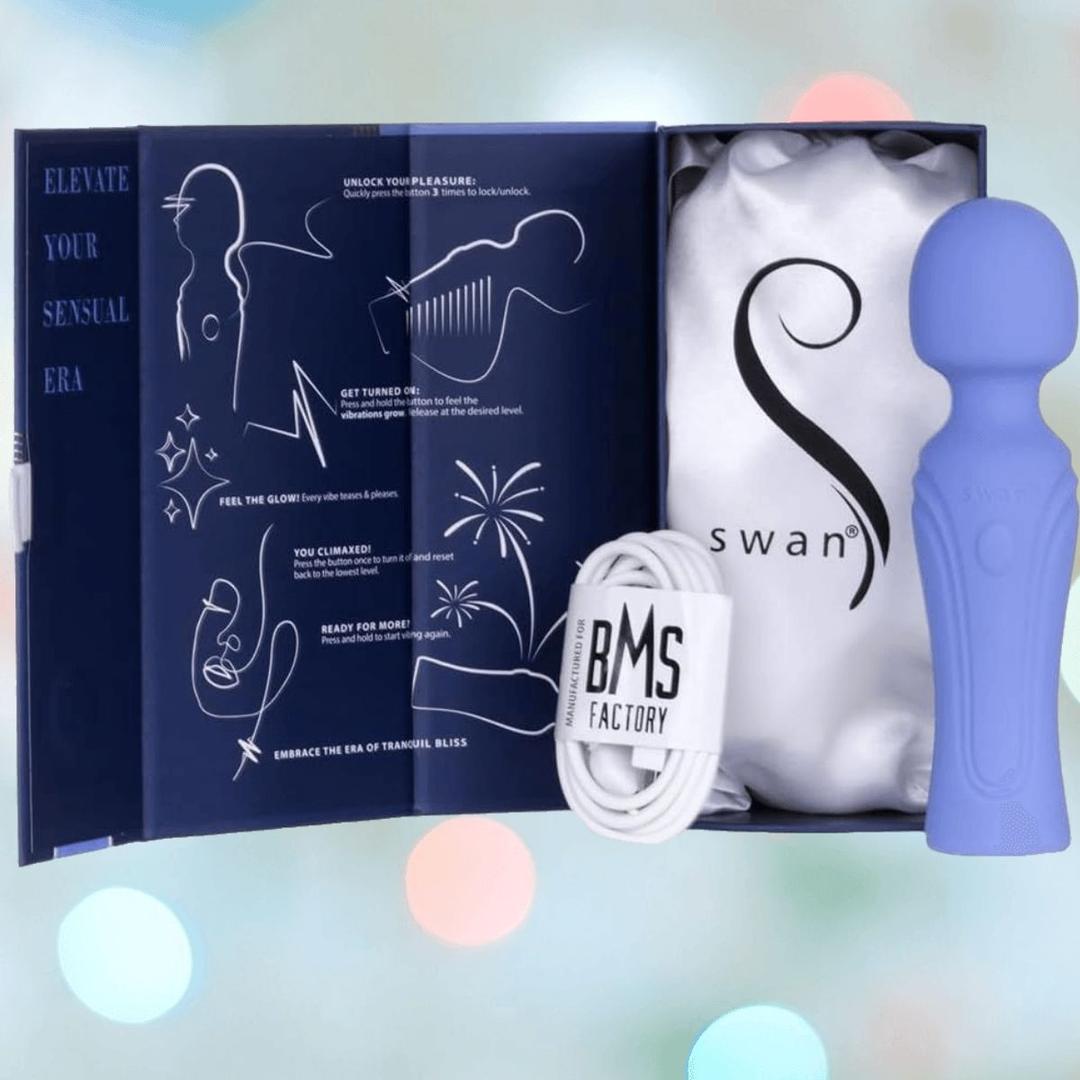 The Swan Era Wand by BMS comes as a boxed set with a PowerBullet motor, white USB charging cable, and illustrated manual, all branded with "Swan" and "BMS Factory" logos.