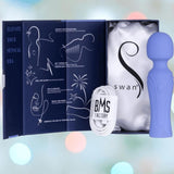 The Swan Era Wand by BMS comes as a boxed set with a PowerBullet motor, white USB charging cable, and illustrated manual, all branded with "Swan" and "BMS Factory" logos.