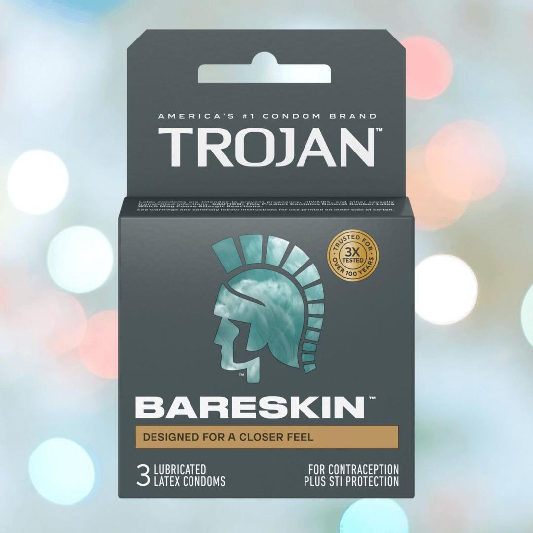 Trojan BareSkin Ultra Thin Condoms by Trojan feature a teal helmet logo and “Designed for a closer feel.” Each box includes 3 ultra-thin latex condoms for contraception and STI protection.
