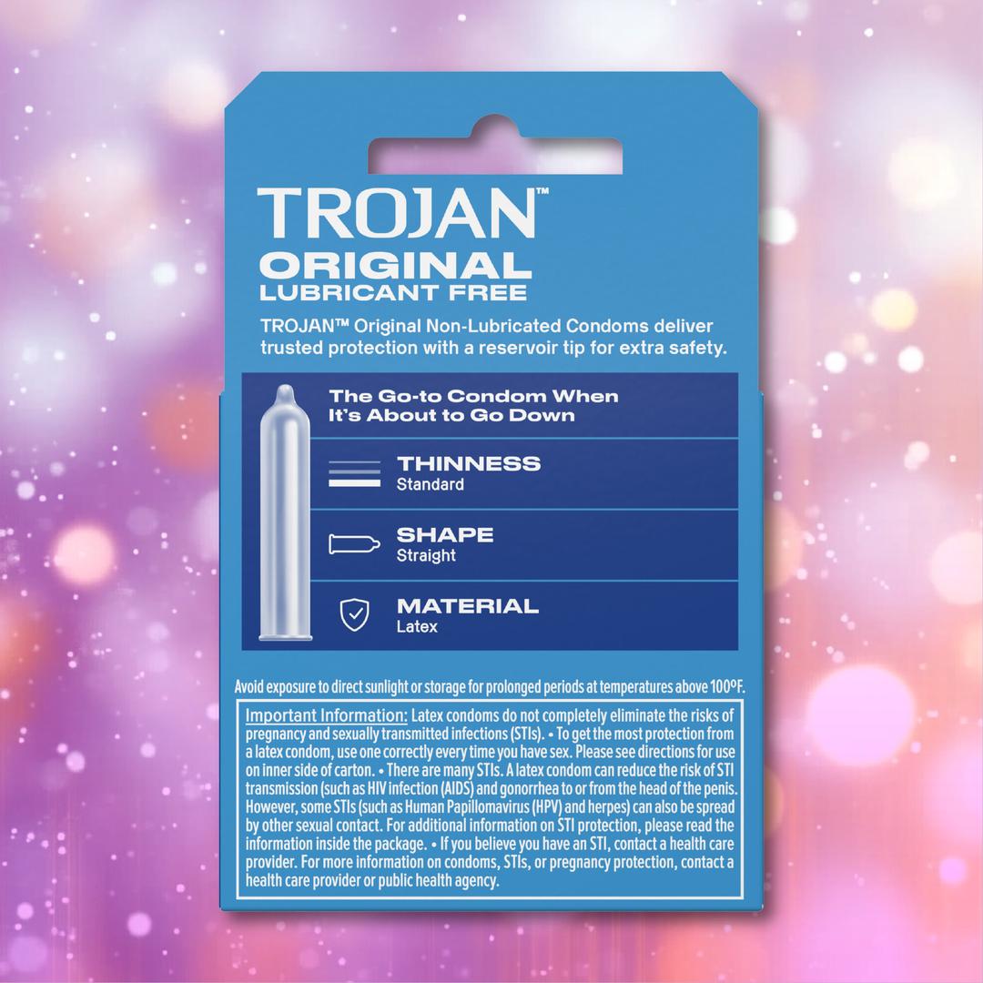 A blue box of Trojan ENZ Condoms Without Lube by Trojan, featuring a classic thin latex design, is set against a pink and purple bokeh background—ideal for those wanting non-lubricated condoms.