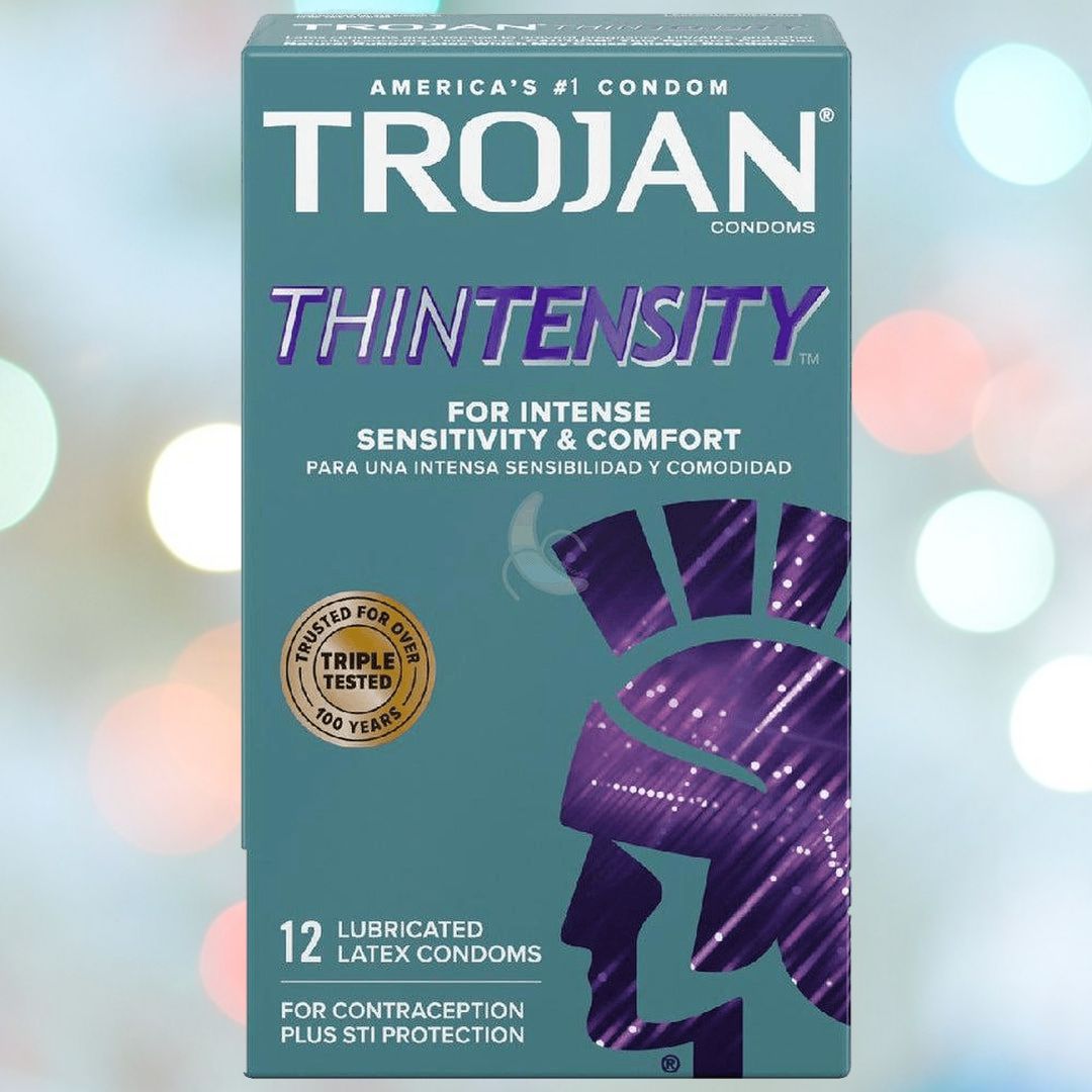 A package of Trojan's Thintensity Condoms prominently displays the brand's logo and guarantees heightened sensitivity and comfort. These condoms feature an ultra-smooth lubricant and include 12 lubricated latex condoms, providing dependable protection against STIs and serving as an effective contraceptive.