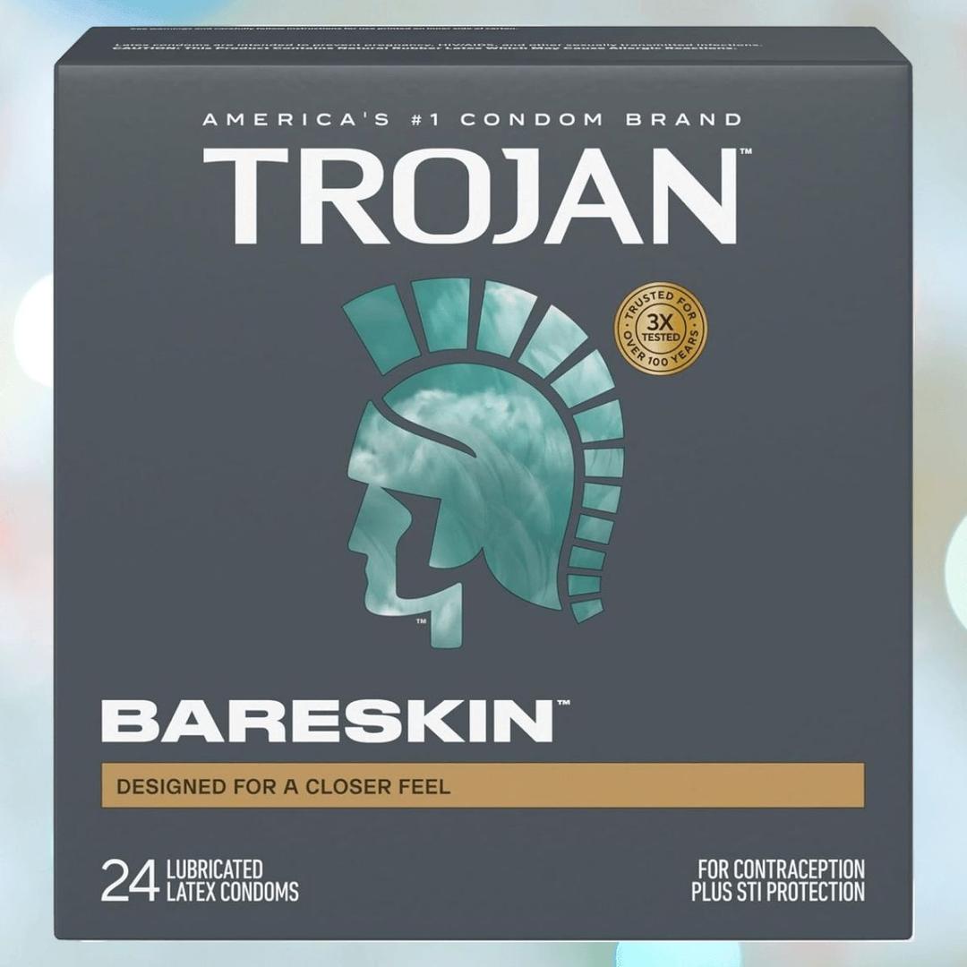A 24-count box of Trojan BareSkin Ultra Thin Condoms by Trojan, with a teal helmet logo, features "Designed for a closer feel" on its packaging and offers ultra-thin condoms for contraception and STI protection.