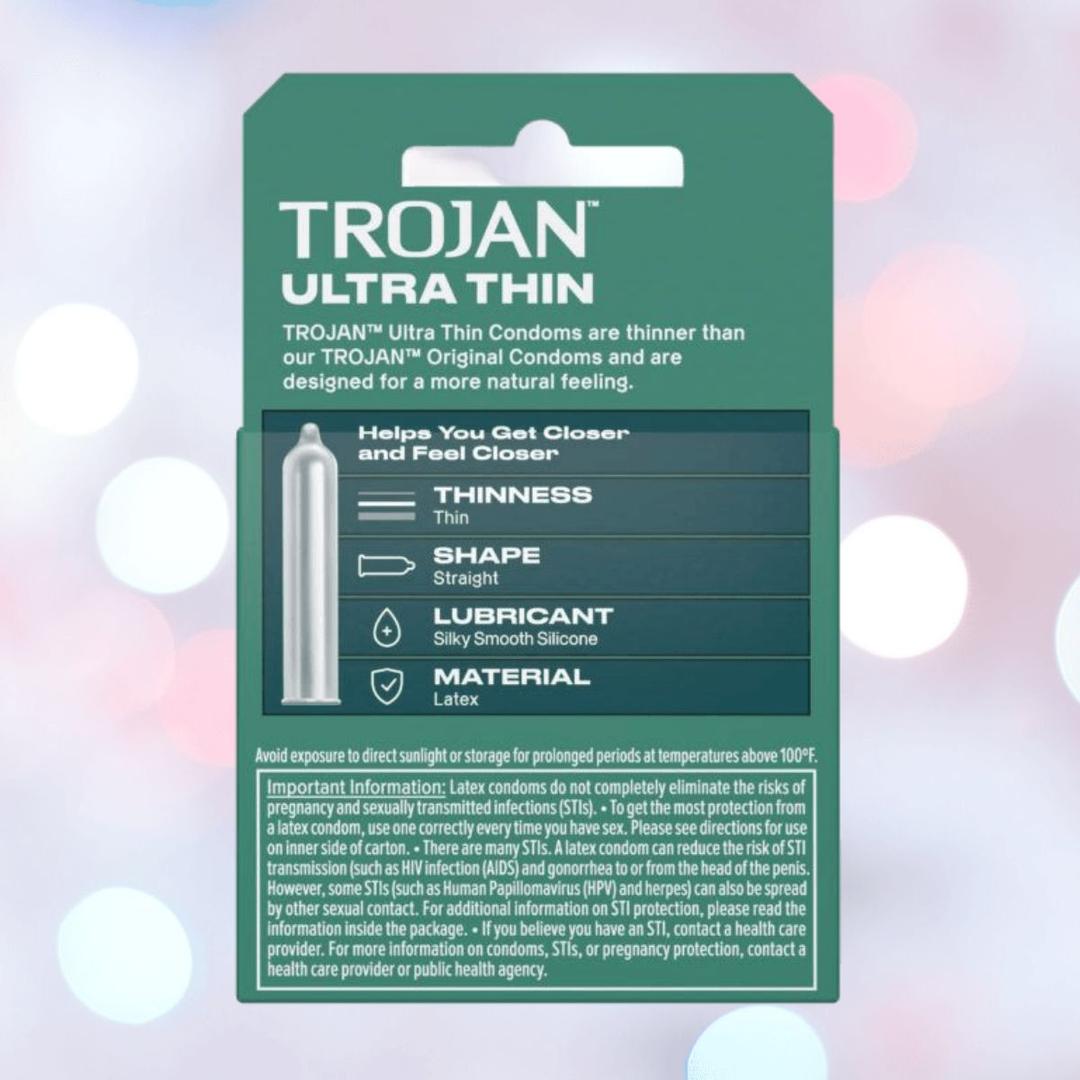 A green box of Trojan Ultra Thin Lubricated Condoms by Trojan is shown, featuring thin latex for natural feel, a straight shape, silky smooth silicone lubricant, white text, and a condom diagram on the packaging.
