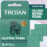 A box of Trojan Ultra Thin Lubricated Condoms by Trojan is shown, with green packaging, the helmet logo, and three wrappers. Text highlights "For a more natural feeling" and "America's #1 condom brand," emphasizing ultra thin design.