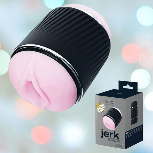 Photograph of a black and pink cylindrical adult toy crafted from body-safe material, alongside its packaging labeled "VeDO Jerk Masturbation Sleeve." The gentle blur of vibrant lights in the background creates a celebratory atmosphere, accentuating the stylish design of this product from VeDO. 1080