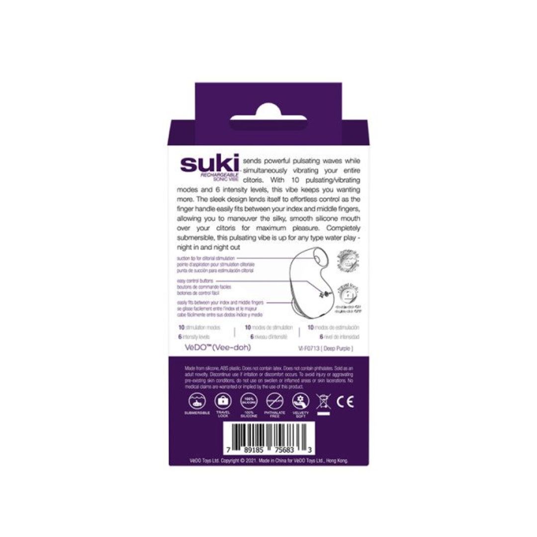 The image showcases the back of the packaging for a product named "VeDO Suki - Purple Air Suction Clit Stimulator." The box details product specifications, features, and instructions. It has a primarily white background with purple accents and includes diagrams and text, some of which are in different languages.