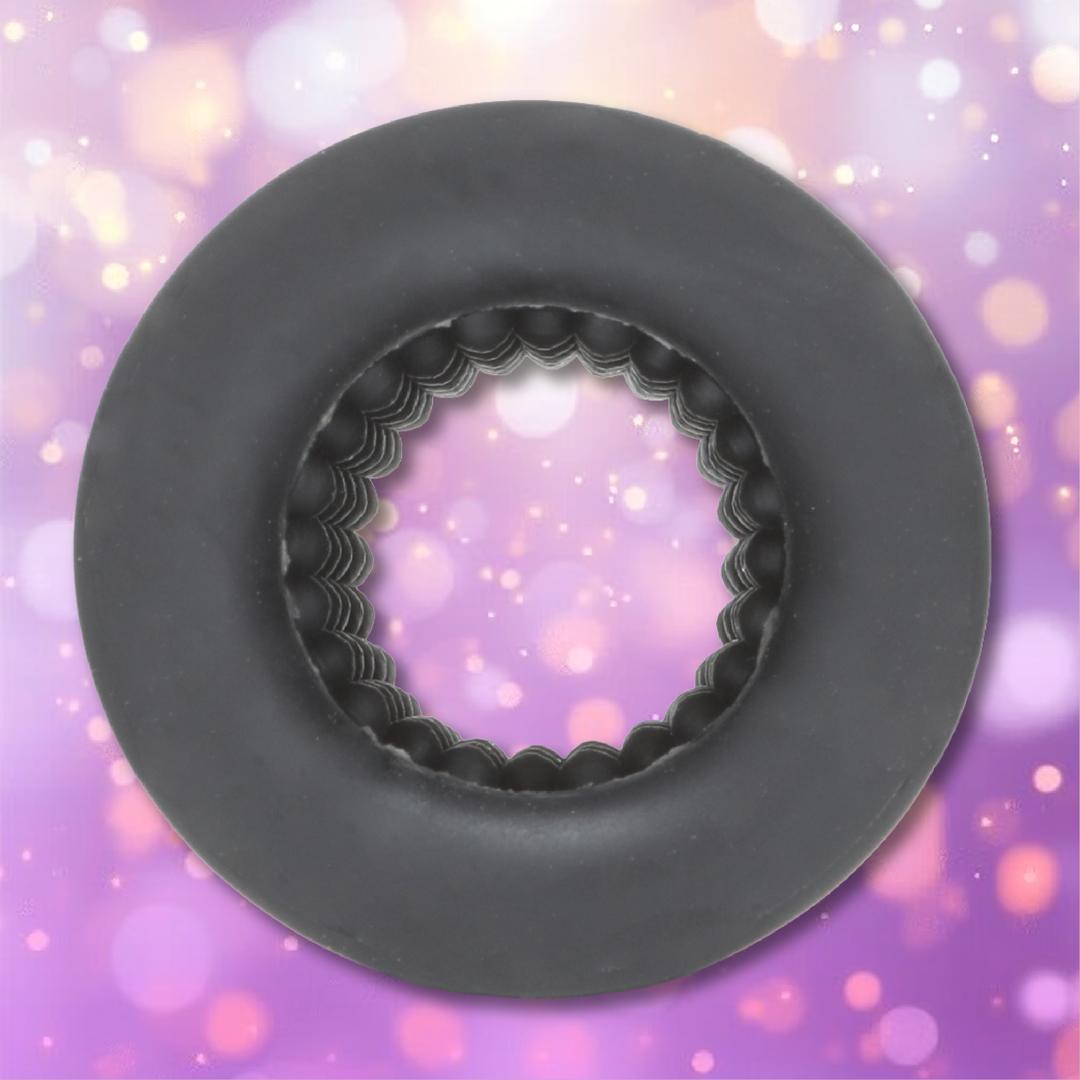 Black ELI Vibelite 4-inch Textured Liquid Silicone Masturbation Stroker, a circular device with a ridged, nubby interior.
