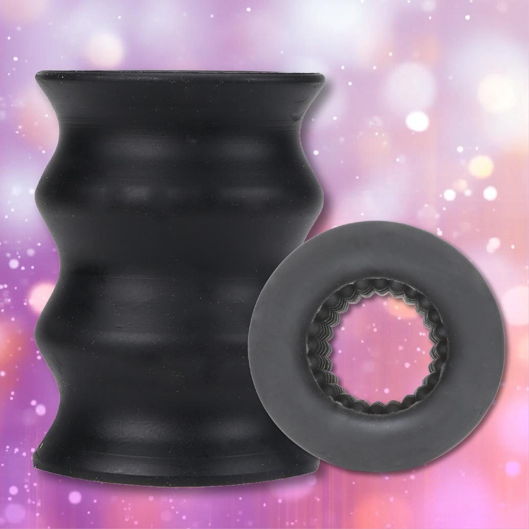 Black ELI Vibelite 4-inch Textured Liquid Silicone Masturbation Stroker with a cylindrical body and a circular opening featuring a nubby interior.