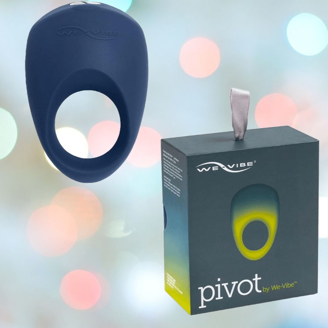 An image of a navy blue We-Vibe "Pivot" Vibrating Penis Ring w/ Smart App next to its product box. The ring has an oval shape with a central hole and a curved edge. The predominantly grey packaging with a yellow accent displays the We-Vibe brand name and product name. The background features blurred, circular light spots.