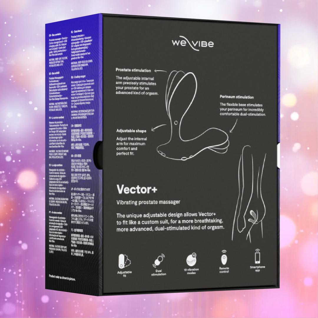 Black box packaging for the We-Vibe Vector+ Vibrating Prostate Massager - Charcoal Black by We-Vibe, with product illustrations, features, and icons on a soft pink and purple bokeh background.
