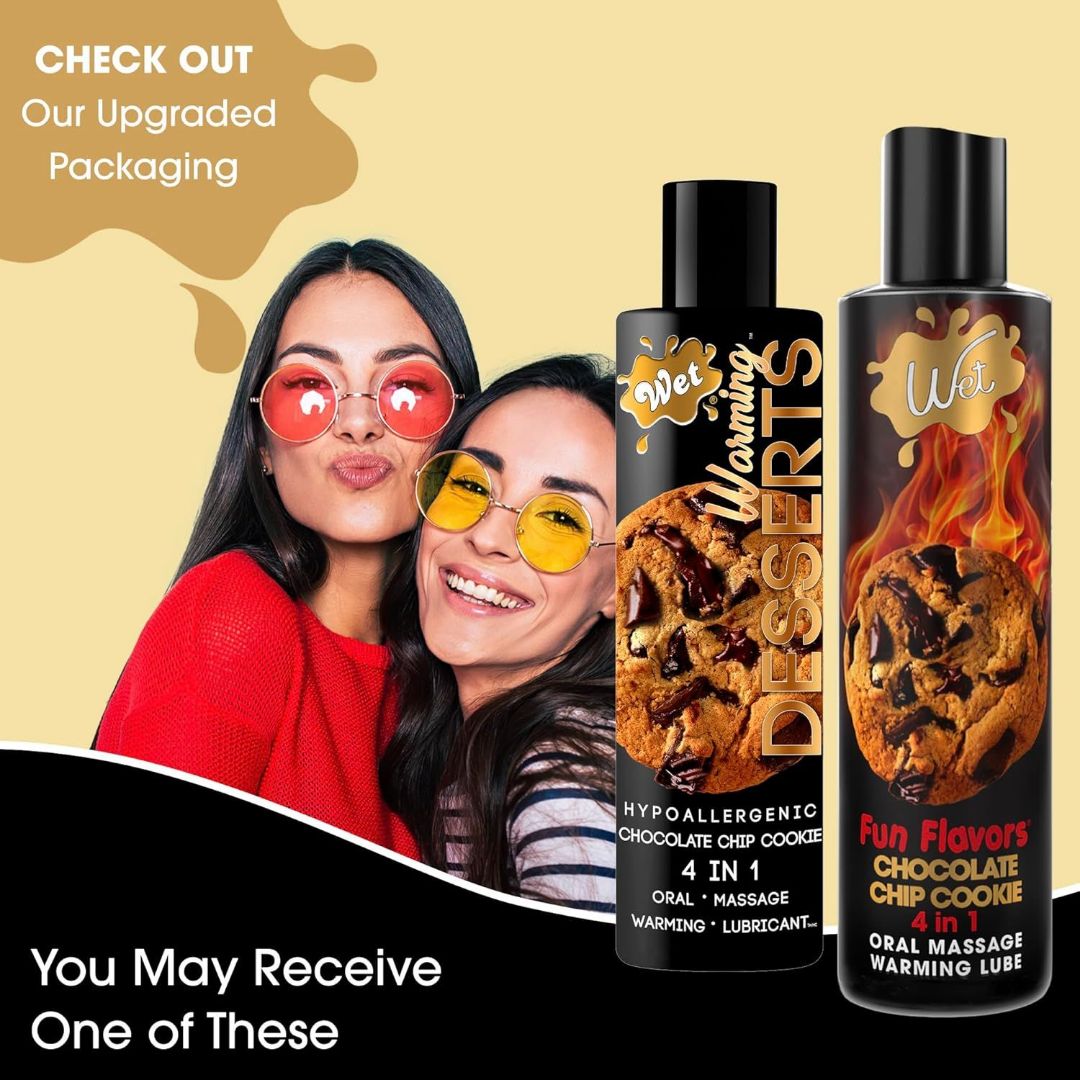 Two individuals smiling wearing sunglasses against a chocolate chip cookie-themed backdrop. The image showcases two bottles: the "Warming Desserts" and "Fun Flavors," labeled as 4-in-1 oral massage warming lubricants with refreshed packaging. Dive into a delightful experience with our Wet Desserts 'Chocolate Chip Cookie' Warming Lubricant, now in a 3oz bottle.