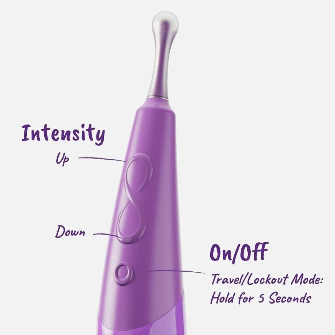 A close-up of the Zumio S Spirotip Clitoral Stimulator - Light Purple by ZUMIO, INC shows the device’s labeled buttons: up/down for adjusting intensity and an on/off button that also activates travel/lockout mode when held for 5 seconds.