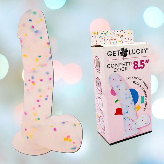 Image of the "Get Lucky Confetti Cock 8.5" Silicone Dildo, a confetti-themed novelty adult toy by Get Lucky, crafted from silicone with a playful design. The packaging highlights its vibrant style while colorful bokeh lights enhance the display, making this suction cup dildo a standout choice for fun enthusiasts. 1080