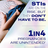 A couple lies in bed under a blue blanket. Bold text reads: "STIs are on the rise, but they don't have to be. 1 in 4 pregnancies are unintended. Choose protection that fits your needs—Durex Air Large Wide Fit Condoms by Durex offer ultra-thin, safe comfort without compromise.