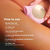 A close-up image captures the LELO SILA Air Suction Clitoral Massager in pink, featuring elegant gold accents. Accompanying the picture are instructions detailing how to charge and operate the device, including LED indicators and settings adjustments using its extra-soft silicone design, as well as directions for turning it off. The massager is held by a person against a neutral background.