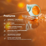 Image shows an aqua LELO SILA Air Suction Clit Massager on an amber background. There are crystals near the toy. Features listed: SENSONIC™ Technology, 8 settings, long-lasting charge, sculpted for pleasure, waterproof design, and extra-soft silicone offering exceptional clitoral stimulation.