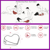 Illustration of three couples enjoying the Liberator Heart Wedge Fur - Rose, a heart-shaped pillow by Liberator. Icons below show its washable cover, faux fur fabric, protective liner, discreet design, and size details.