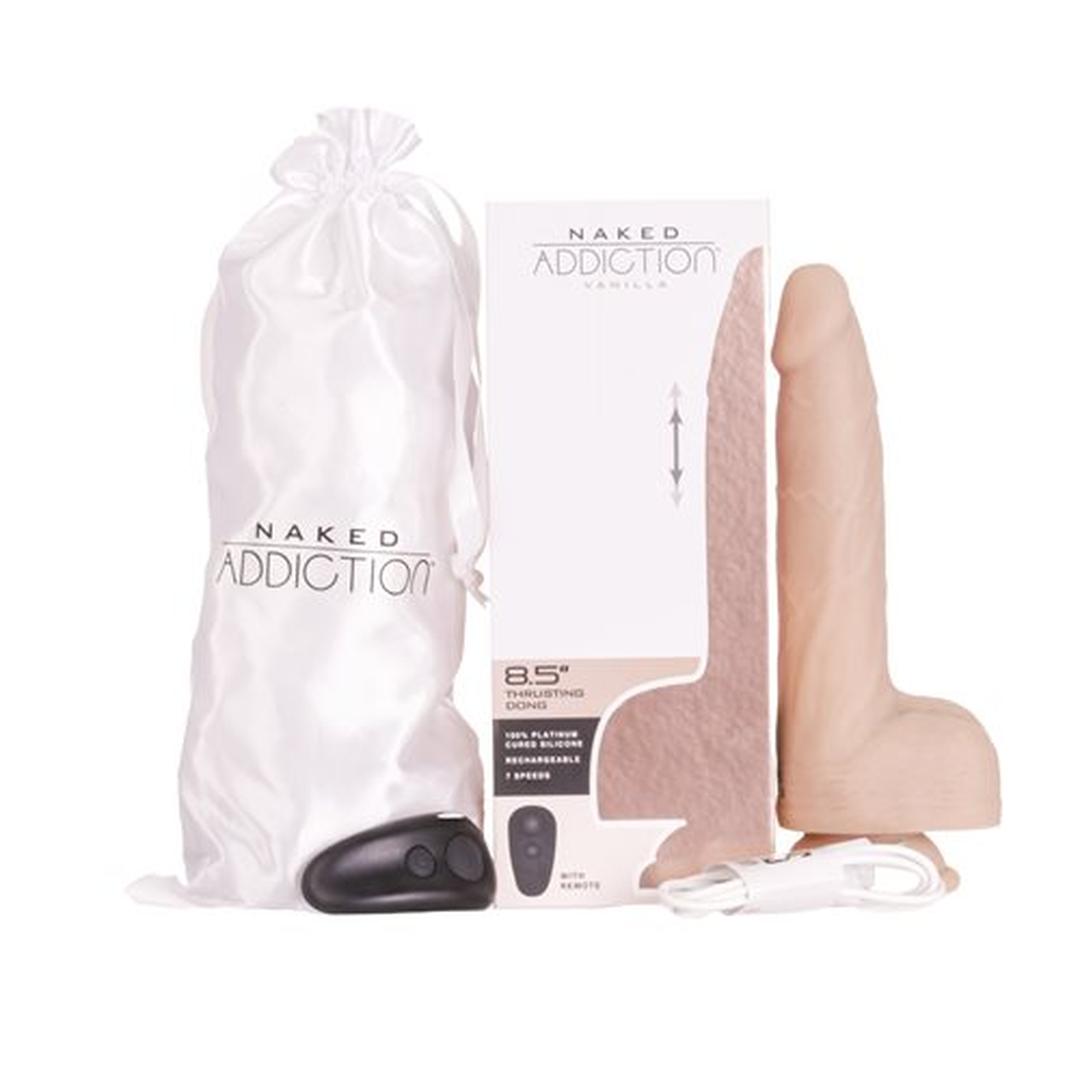 The BMS Naked Addiction Thursting Dong - Vanilla 8.5" features remote control, USB charging cable, and a branded storage bag. Comes in product packaging labeled "Naked Addiction.
