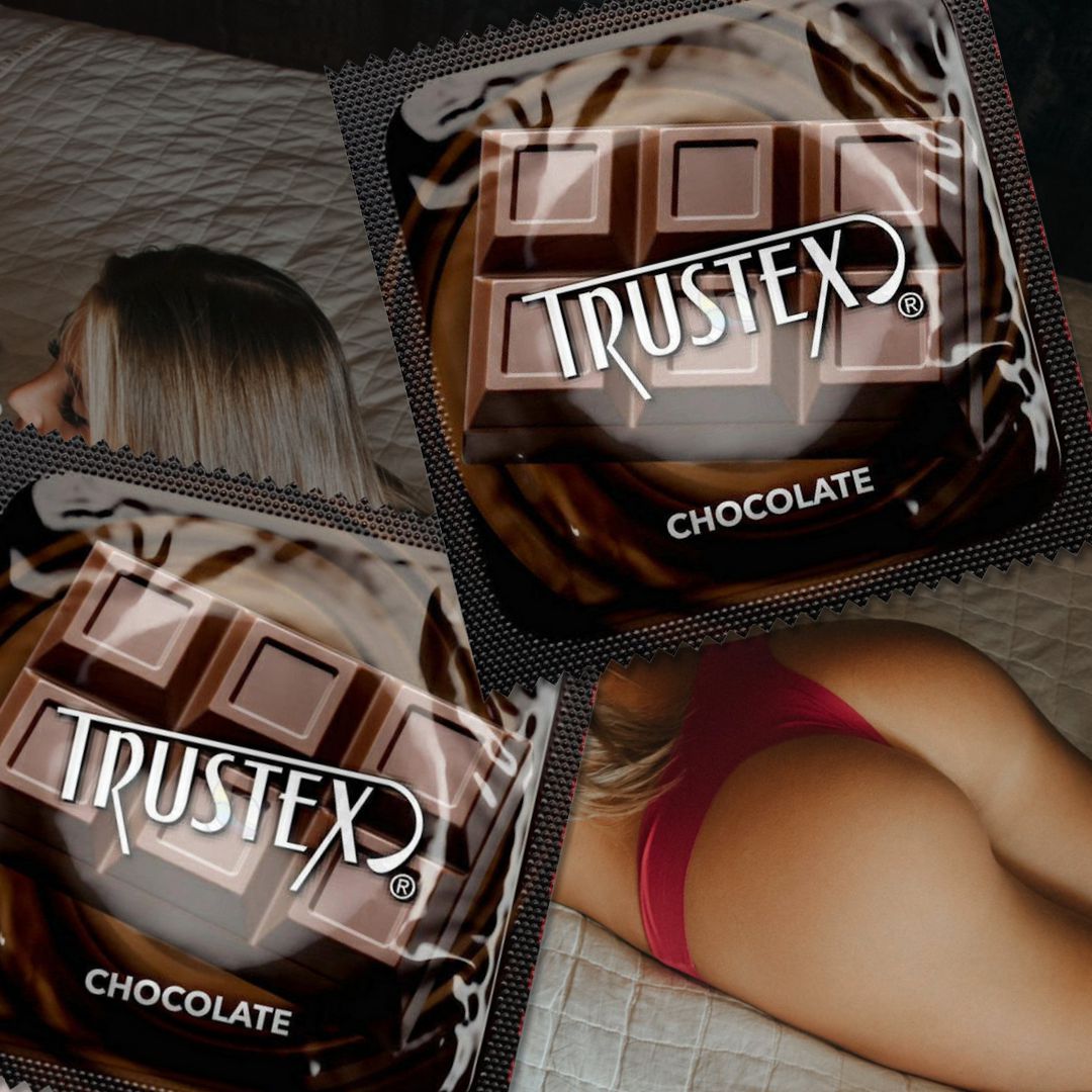 Packages of Trustex Chocolate Flavored Condoms 🍫 are overlapping an image of a person lying on a bed, wearing pink underwear.