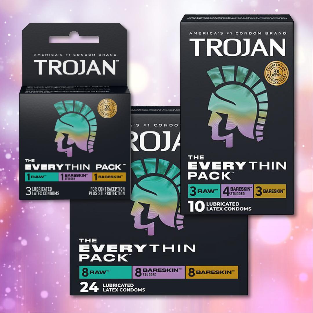 The Trojan Bareskin EveryTHIN Pack (Variety Pack) by Trojan is displayed in multiple sizes against a purple bokeh background, each box featuring a stylized helmet and bold product details.