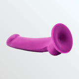 The Avant D9 Ergo MINI 6.5" Non-Porous Silicone Dildo in violet, crafted by Avant from body-safe silicone, rests on a light gray background with its suction cup base.